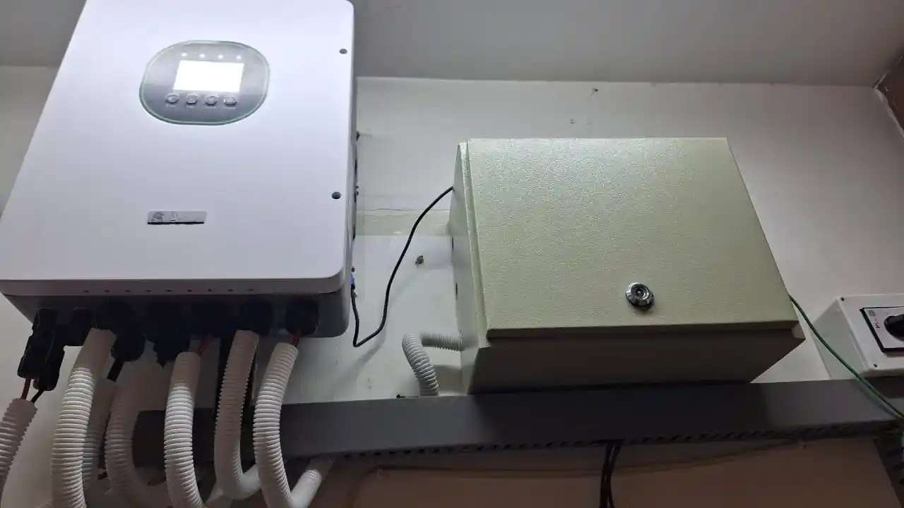 SAJ 6kW hybrid inverter and AC distribution enclosure installed at a home in Clifton Block 8, Karachi
