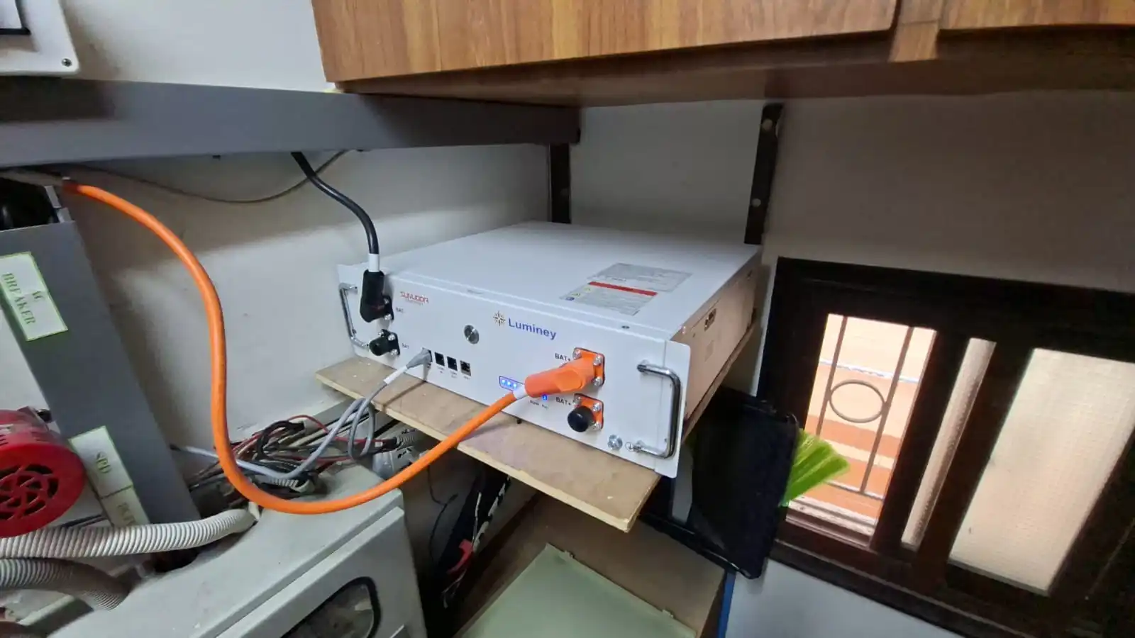 Sunwoda Atrix 5kWh lithium battery installed in a utility area at a Clifton Block 8 home in Karachi
